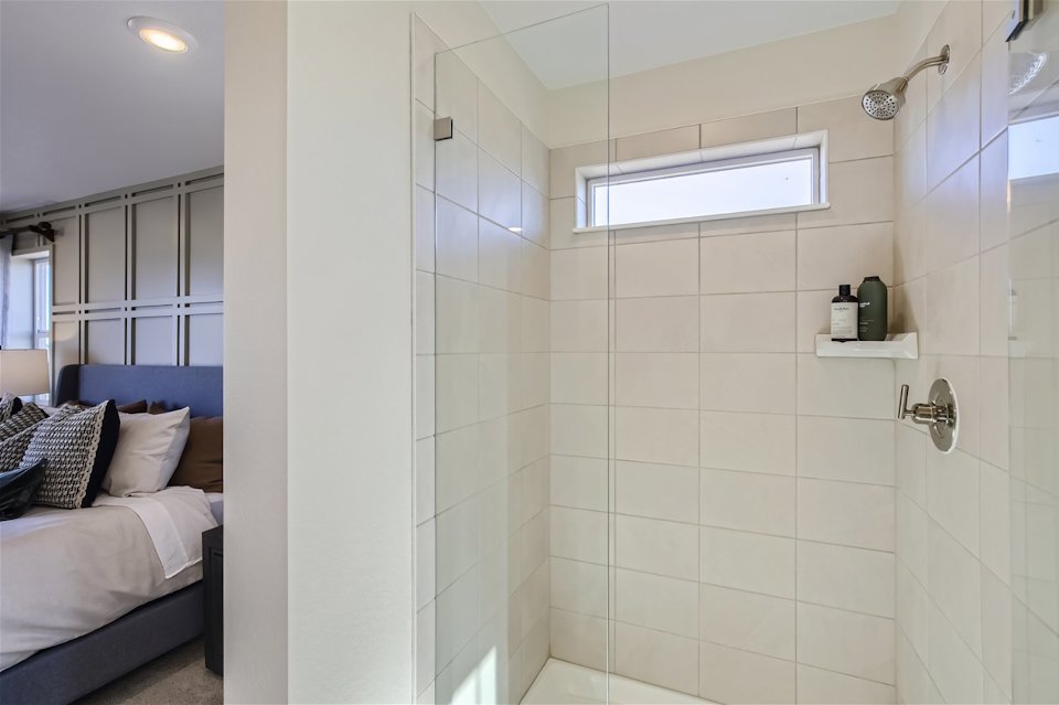 A bathroom with a glass shower.