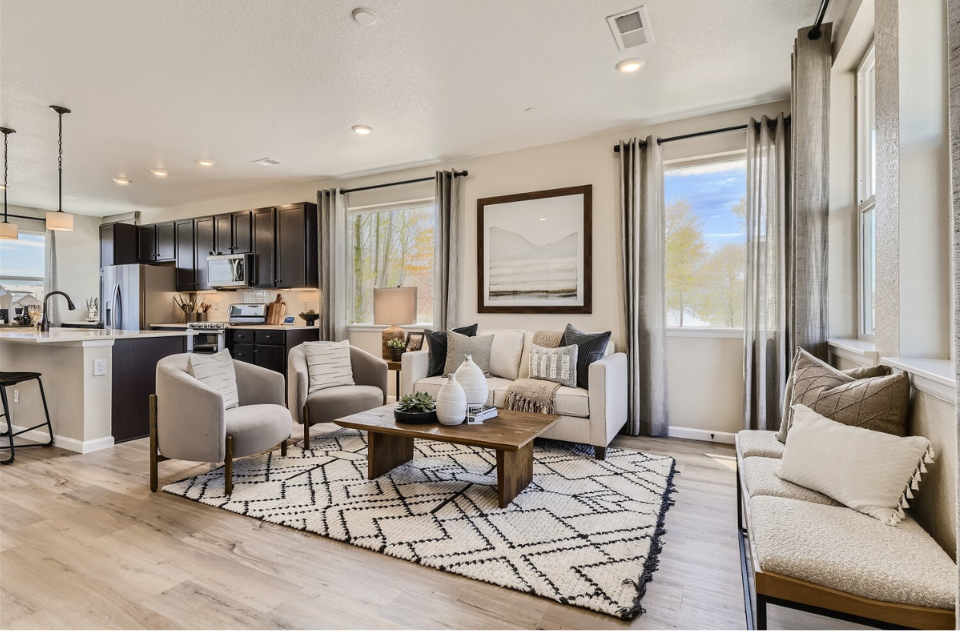 A living room with a large window.