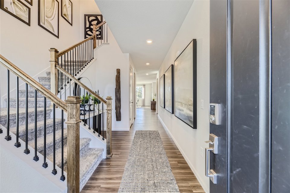 A hallway with white walls.