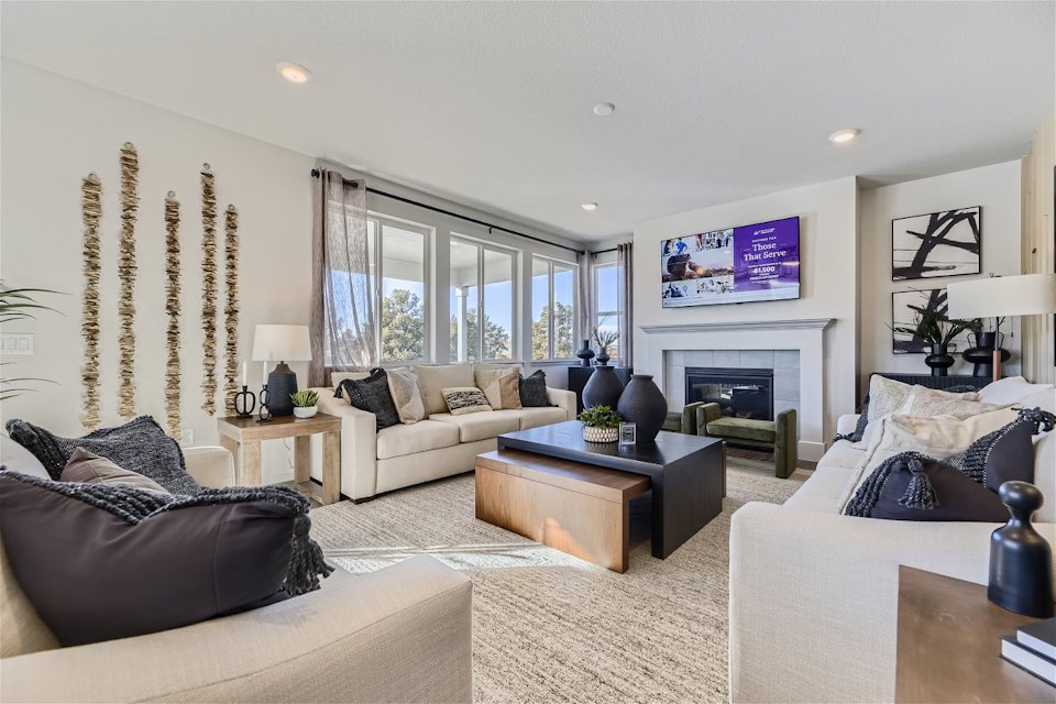 A living room with a fireplace.