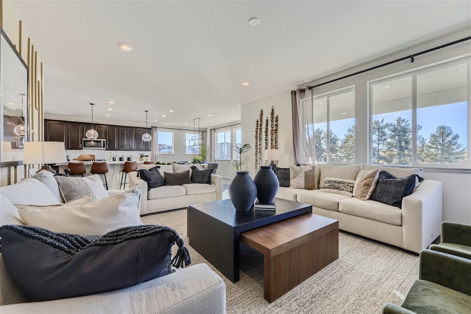 A living room with a large window.
