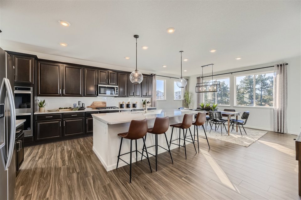 A kitchen with a large island.