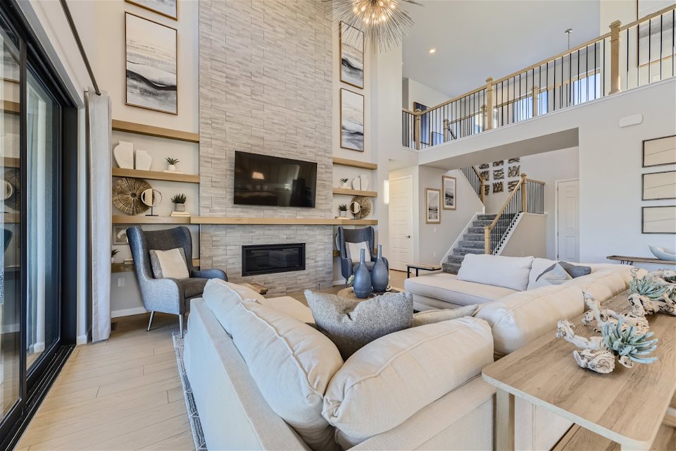 A living room with a fireplace.