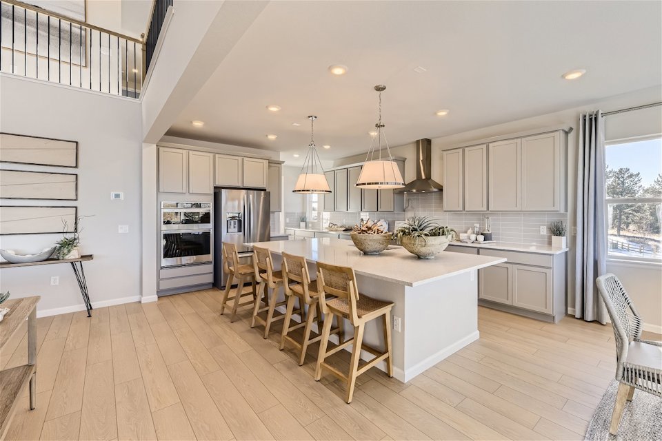 A kitchen with a large island.