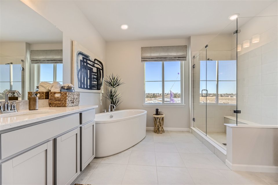 A bathroom with a tub and sink.