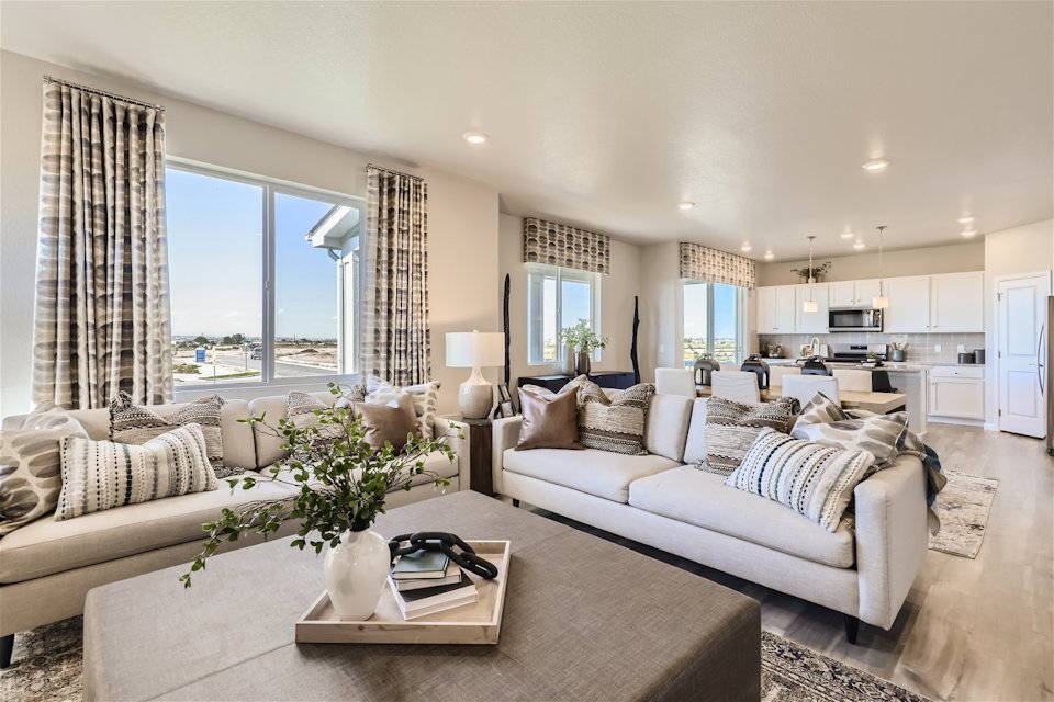 A living room with a large window.