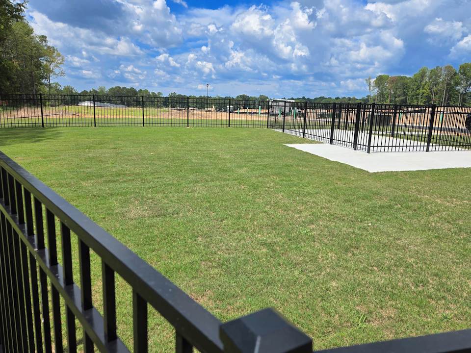 A fenced in field.