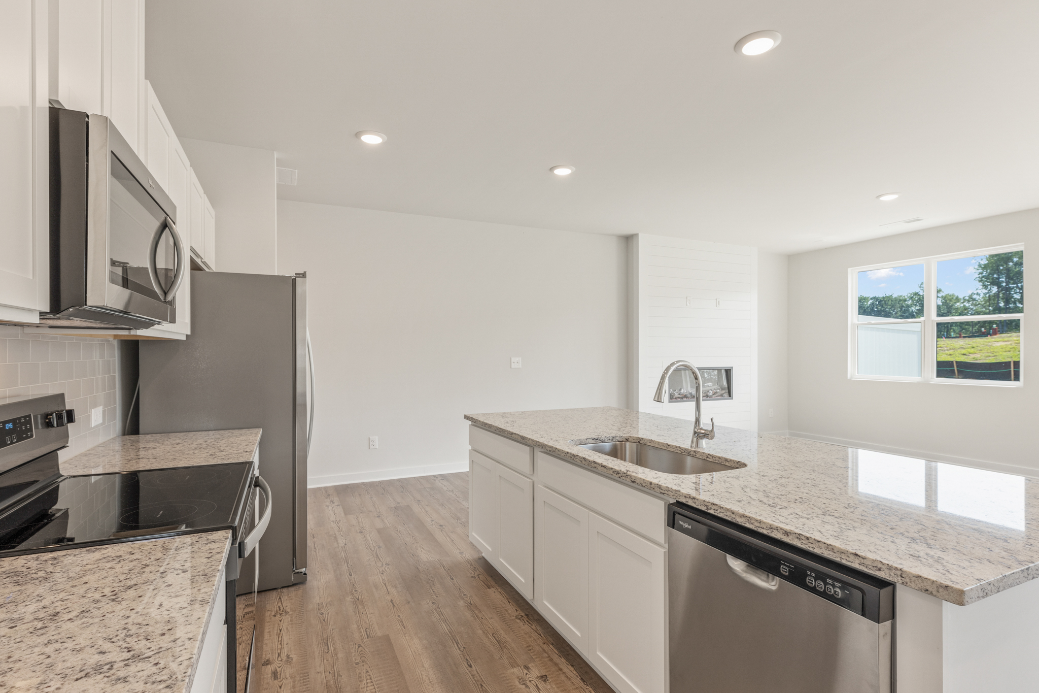 A kitchen with stainless steel appliances.