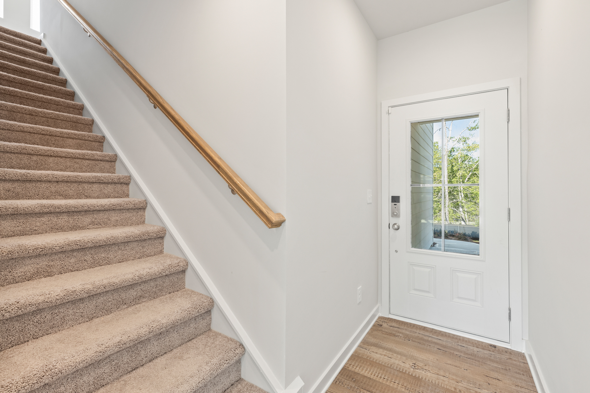 A staircase leading to a door.