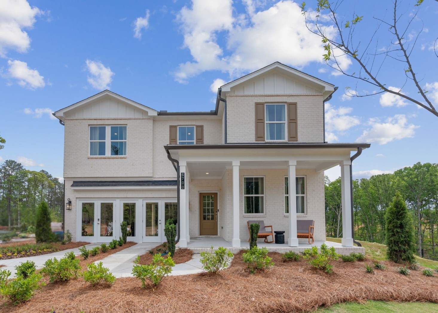 A house with a yard and trees.