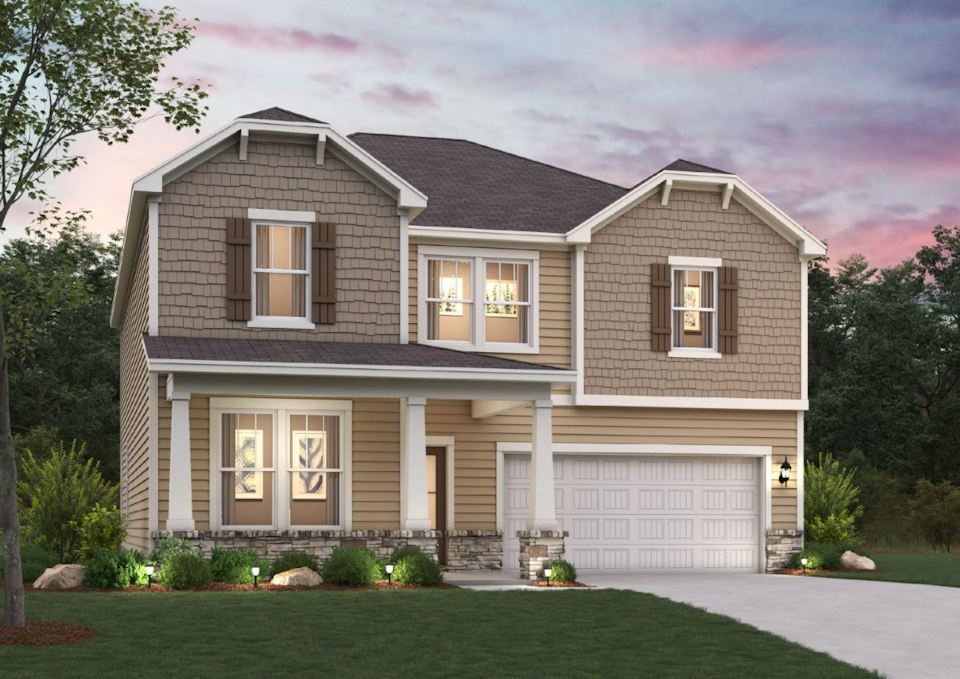 A house with a large front yard.