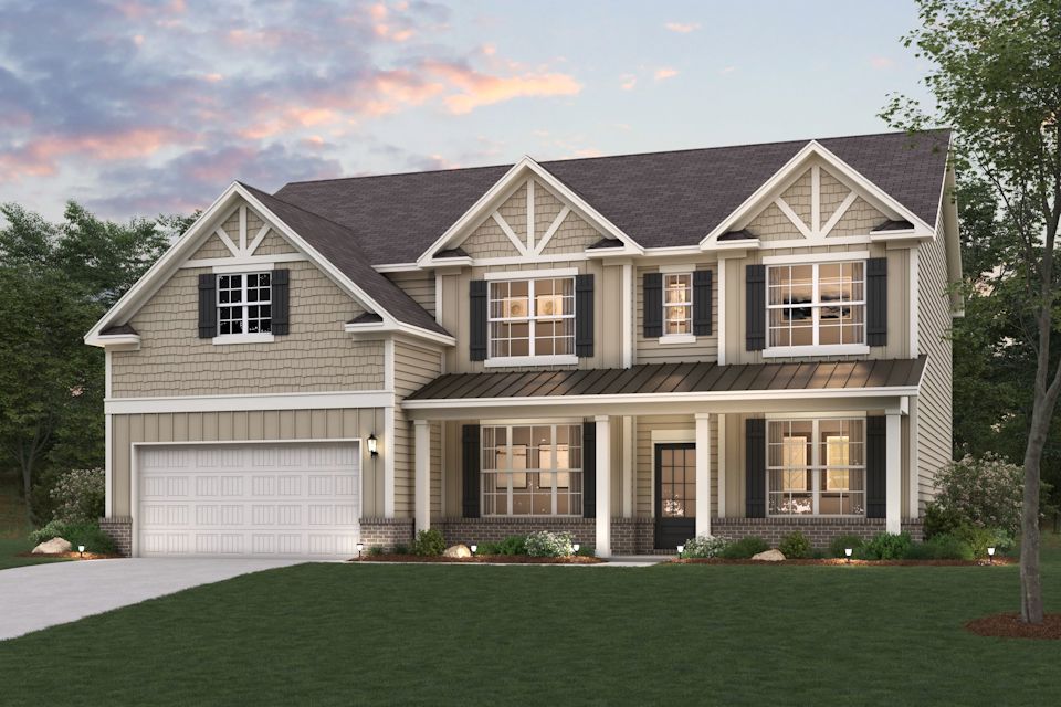 A house with a large front yard.