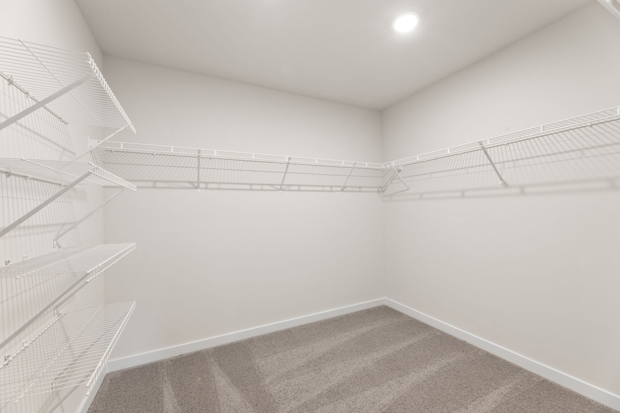 A white staircase in a building.