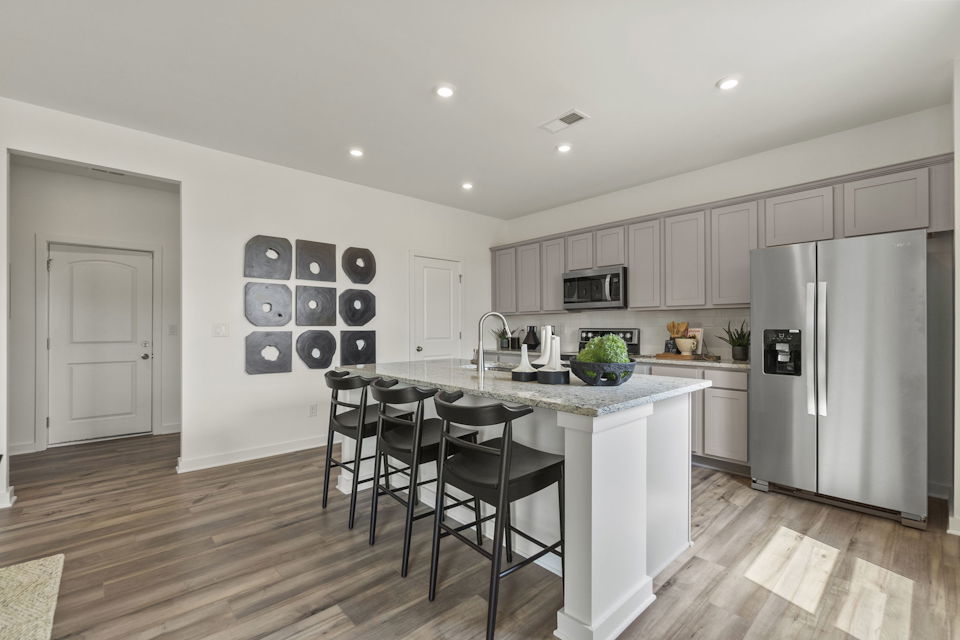 A kitchen with a large island.