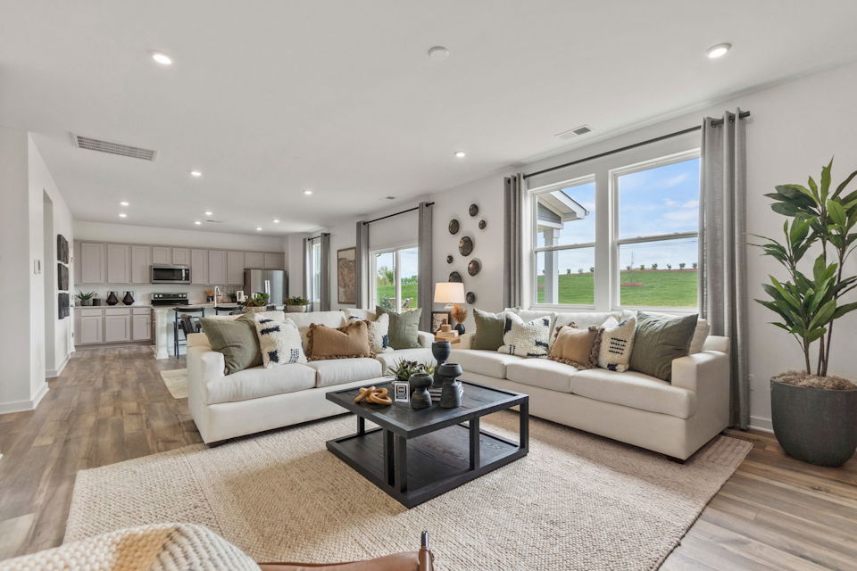 A living room with a large window.