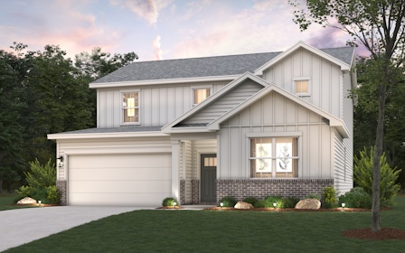 A house with a large front yard.
