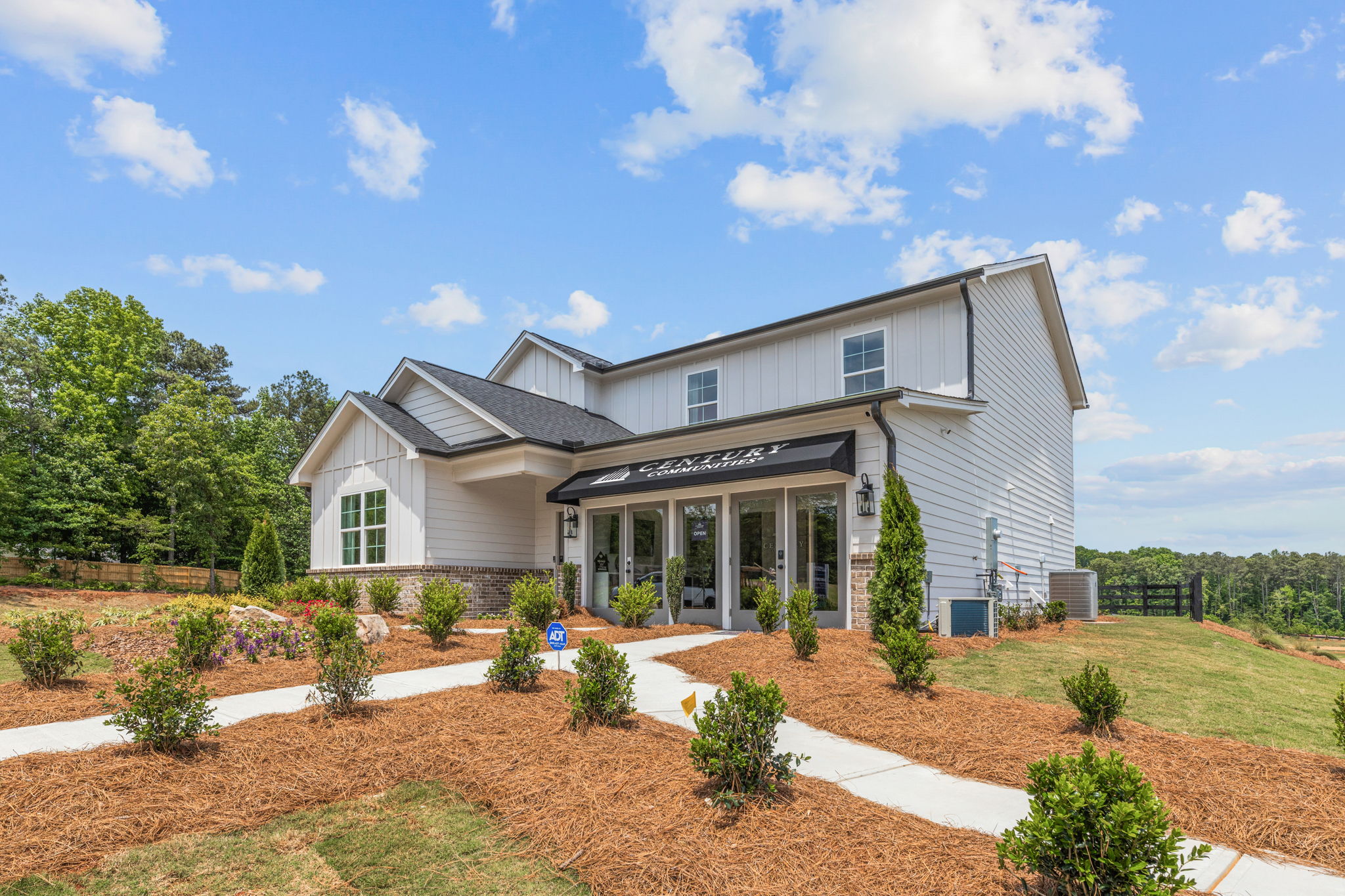 A house with a large front yard.