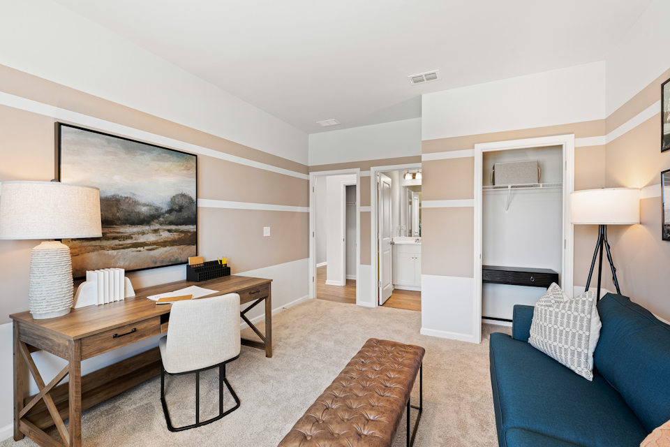 A living room with a dining table.