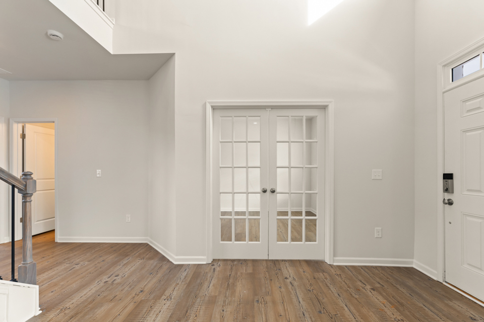 A room with white doors.