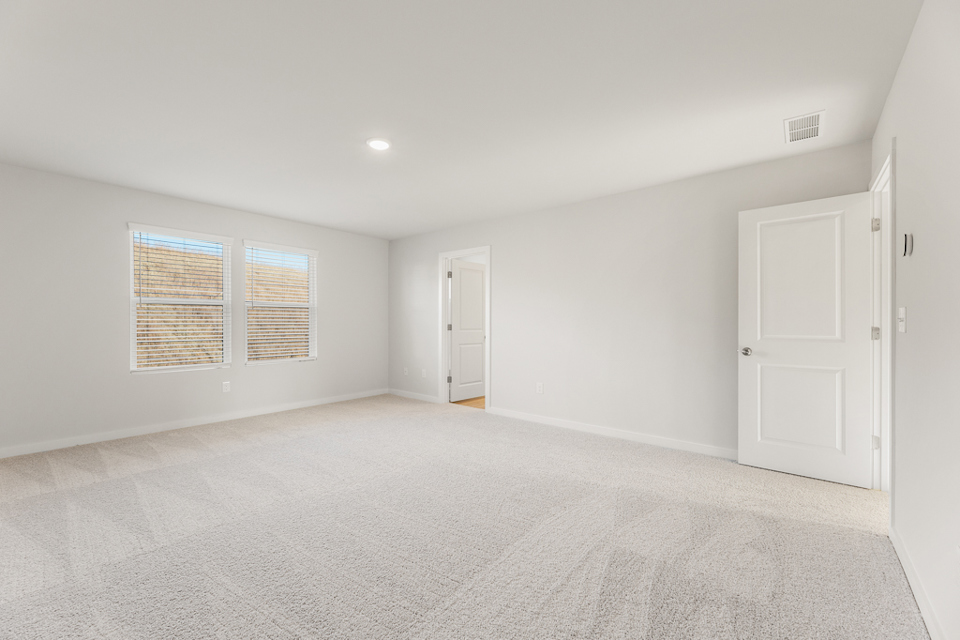 A room with white doors.