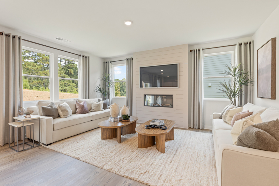 A living room with a large window.