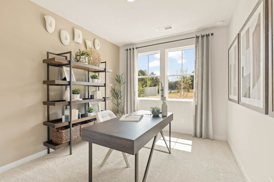 A room with a table and shelves.