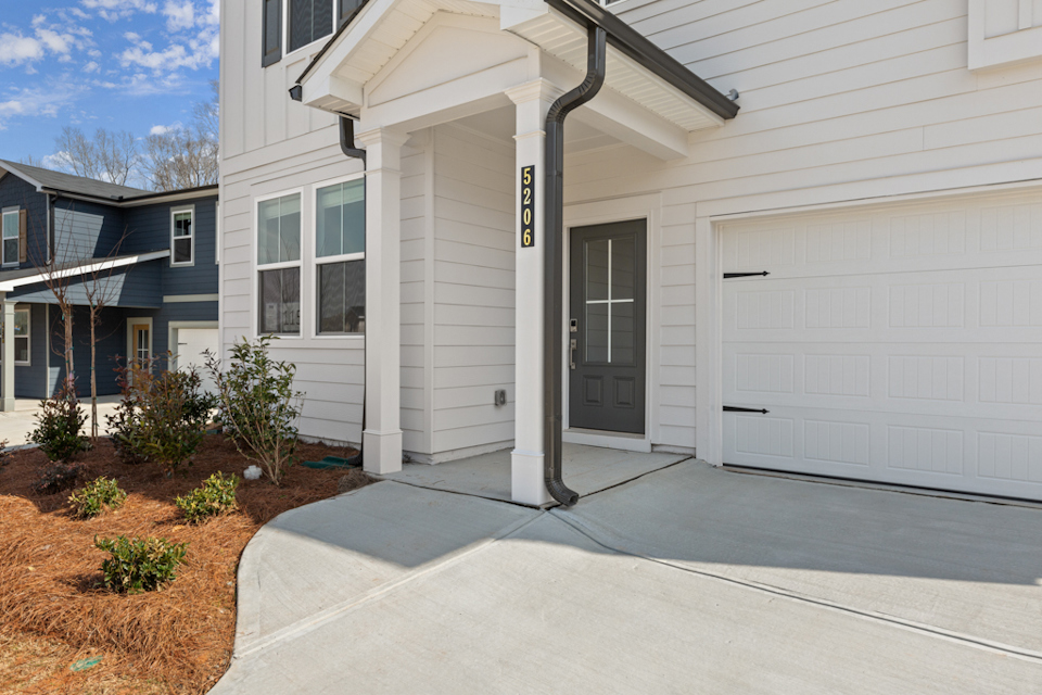 A white garage with a garage.