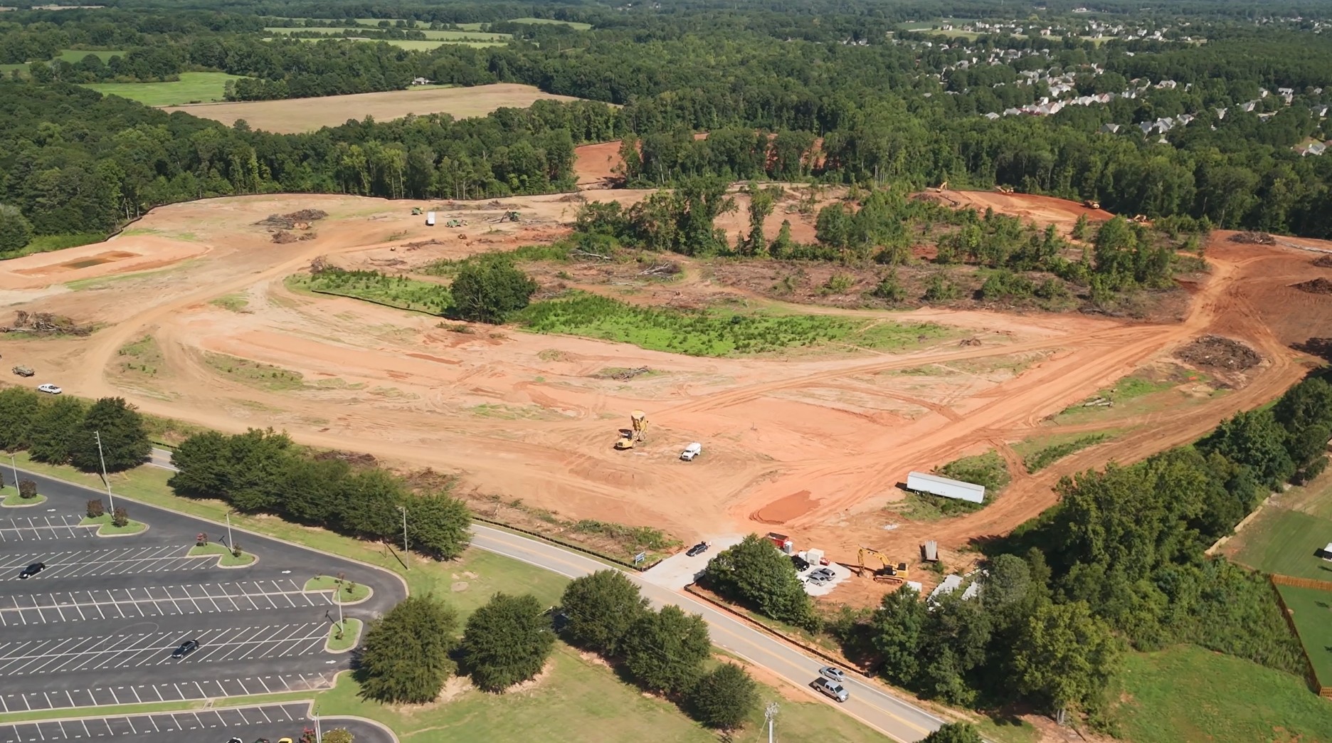 A landscape with trees and buildings.