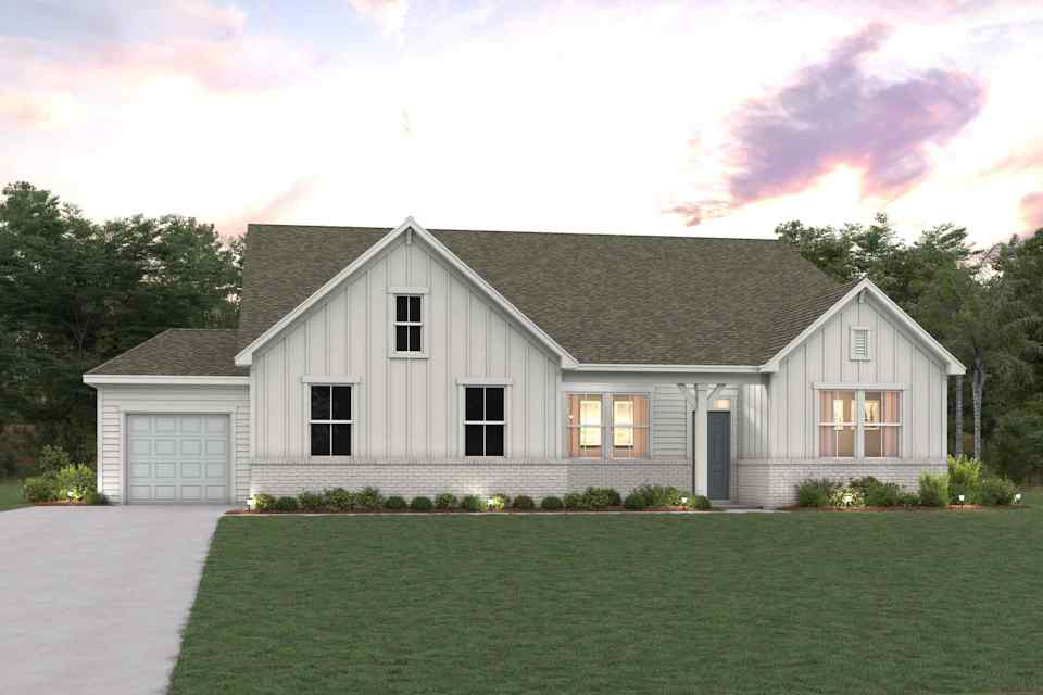 A house with a lawn in front.