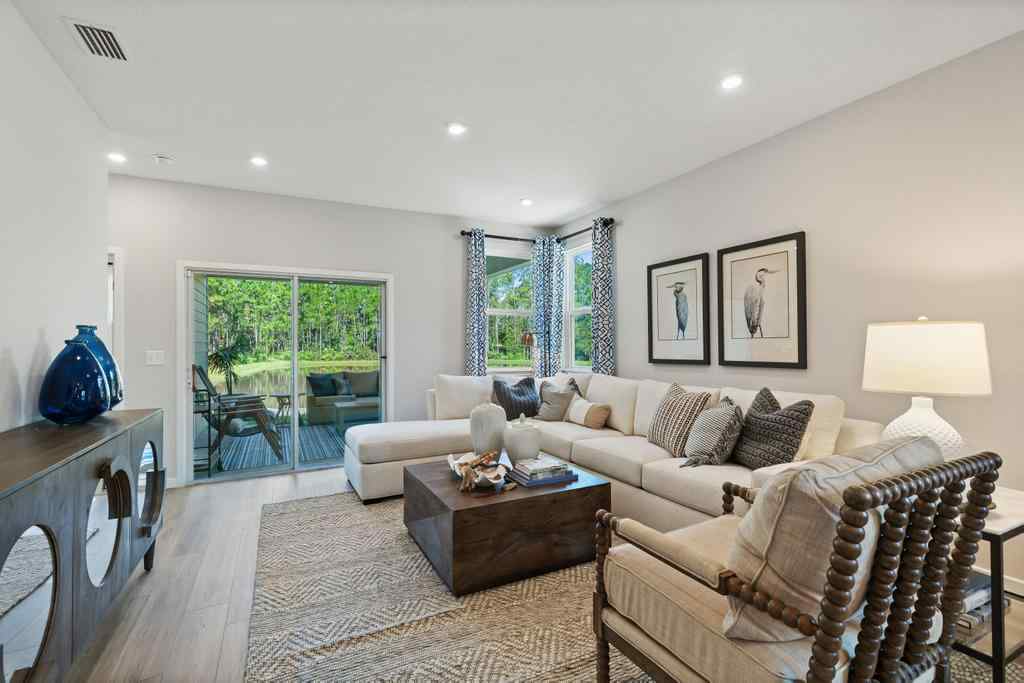 A living room with a couch and a coffee table.