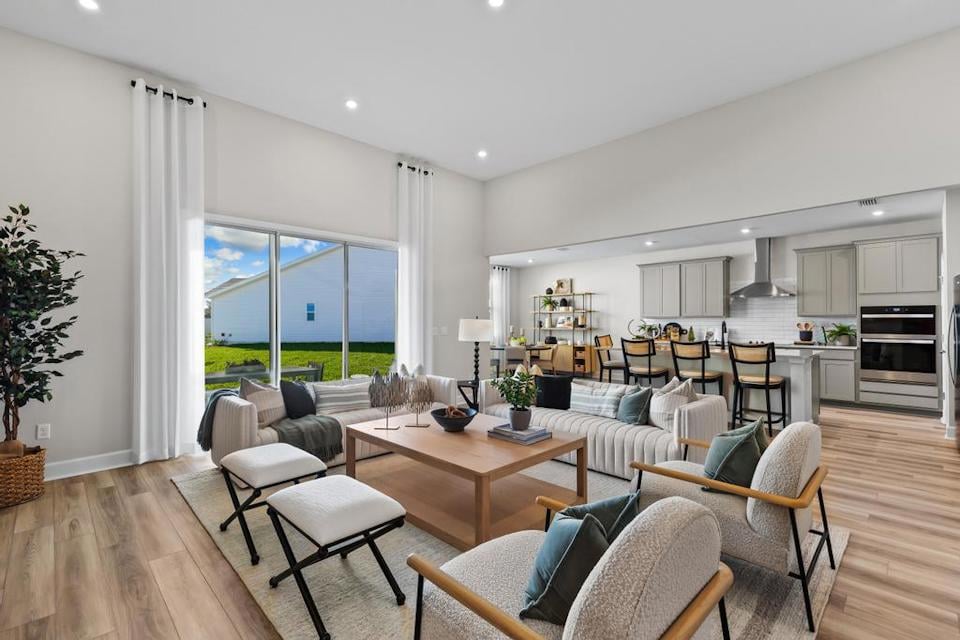 A living room with a large window.