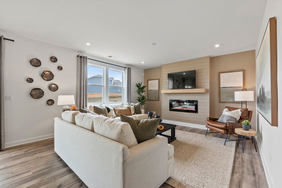 A living room with a fireplace.