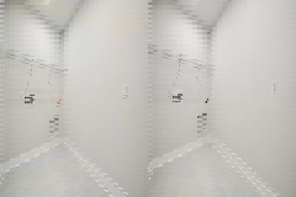 A white tiled room.