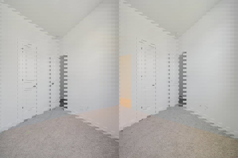 A room with white doors.