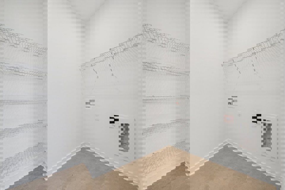 A white room with a white wall.
