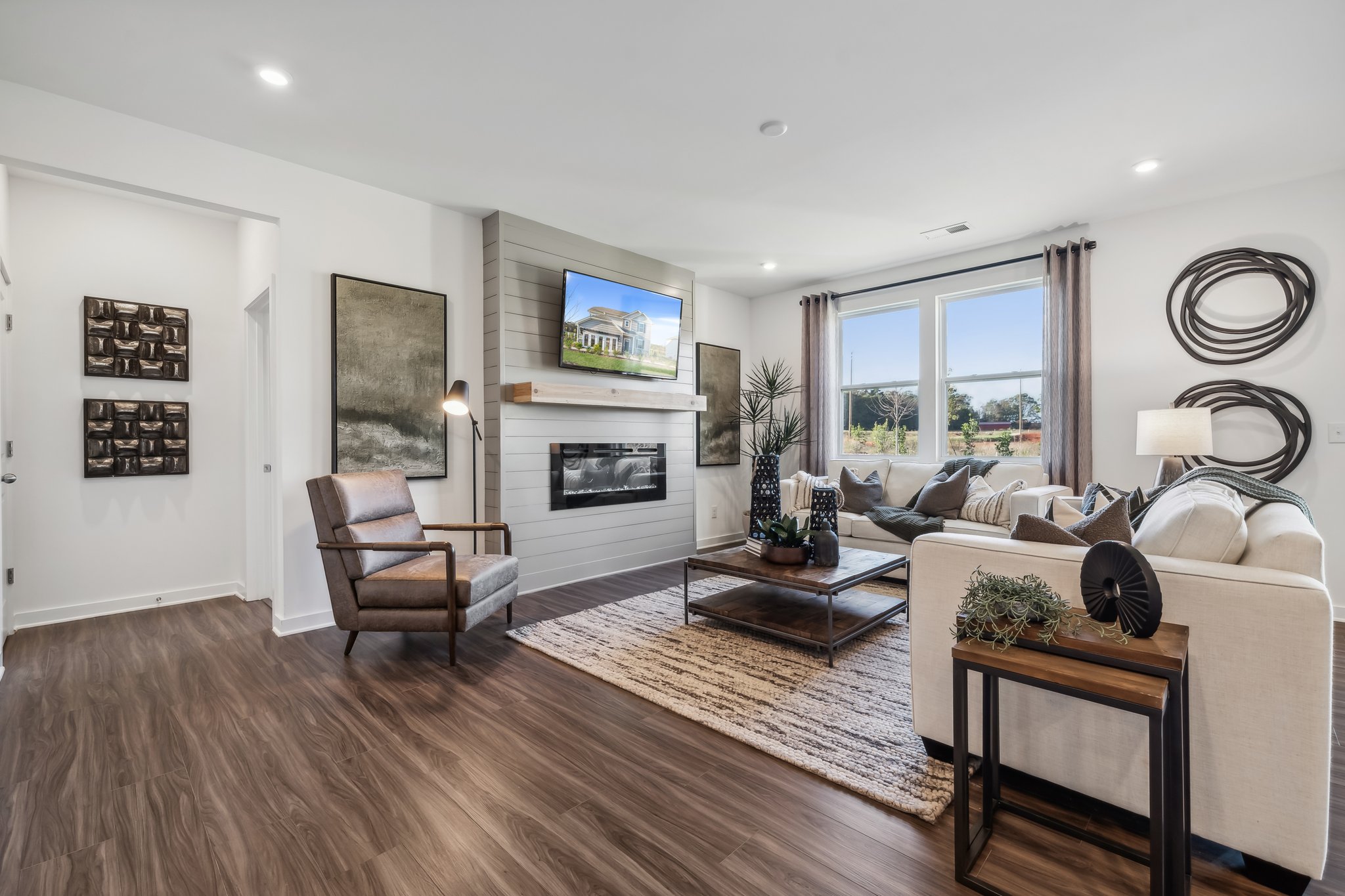 A living room with a fireplace.