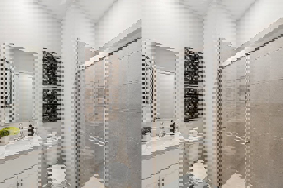 A bathroom with a glass shower.
