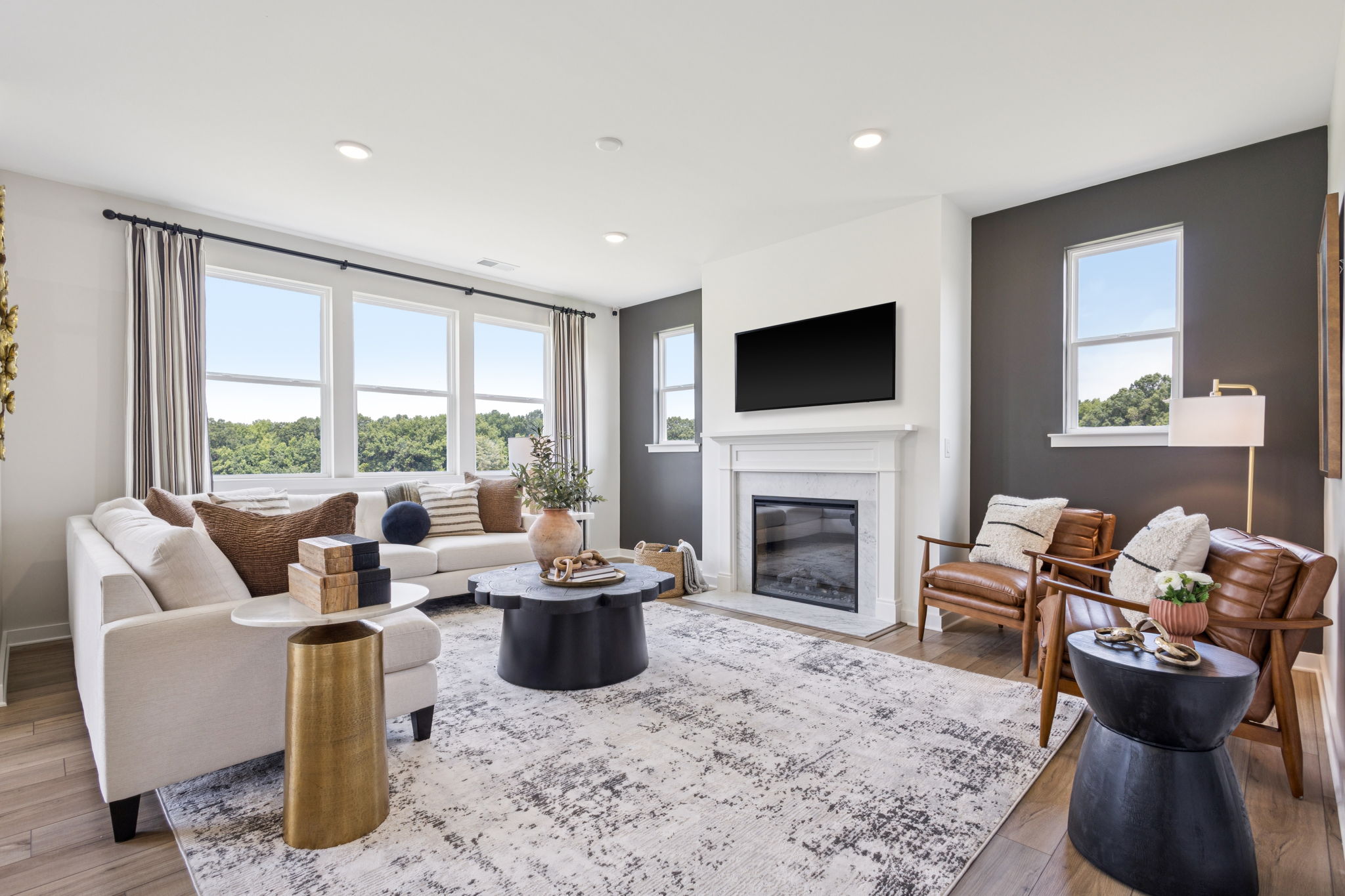 A living room with a fireplace.