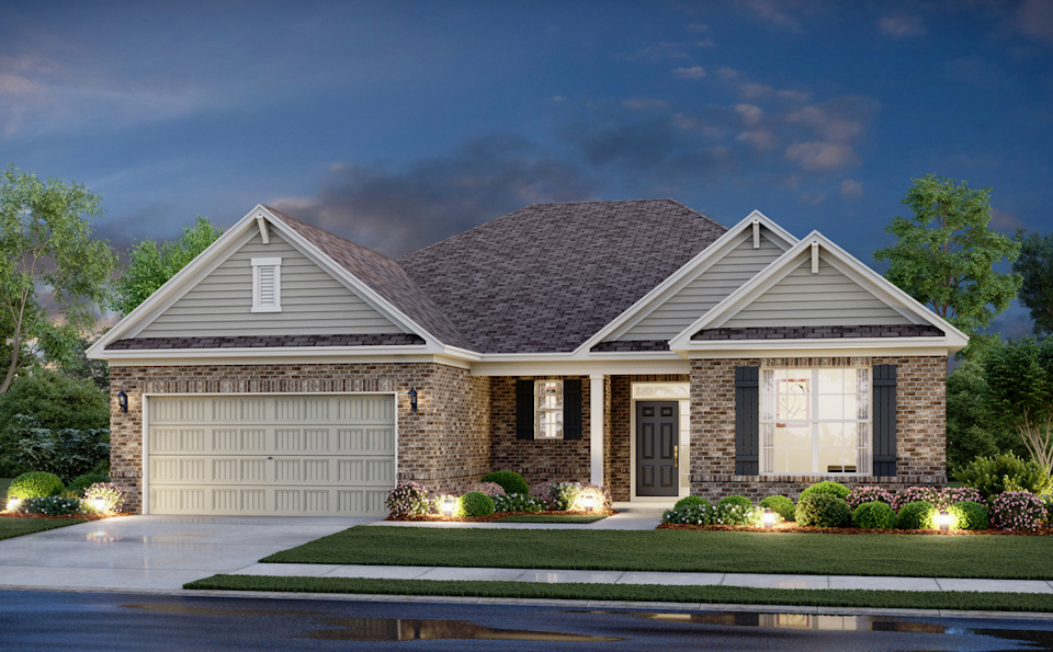 A house with a garage with Little White House in the background.