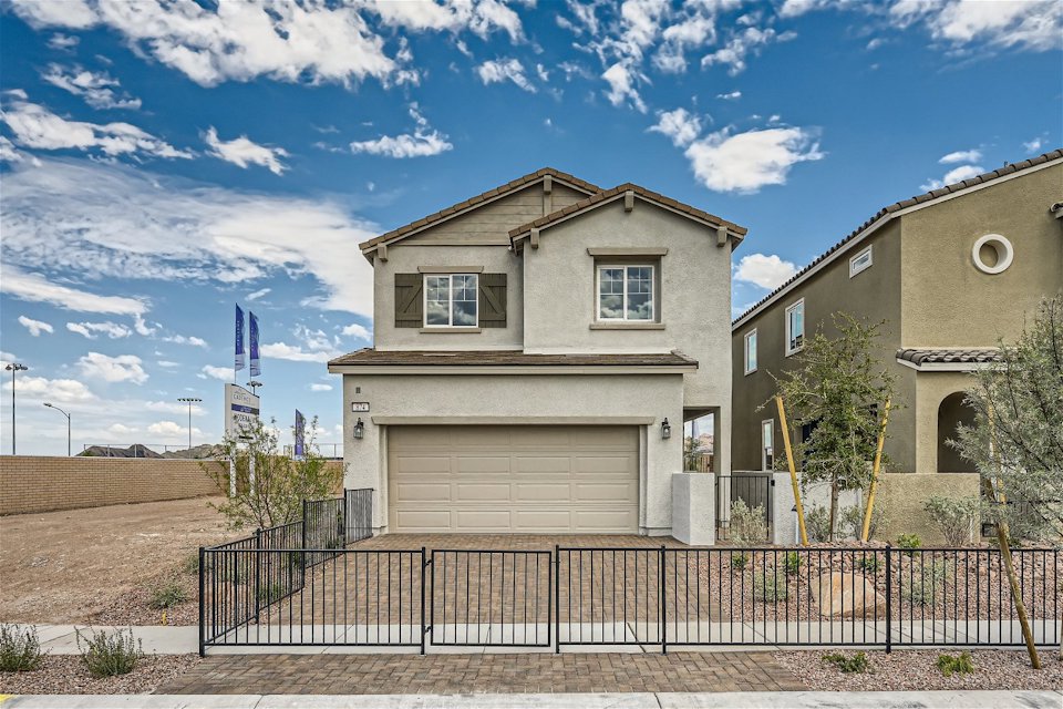 A house with a fence around it.