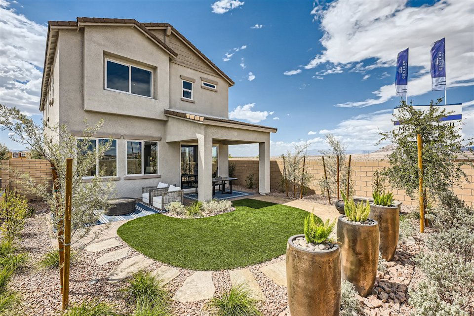 A house with a large front yard.