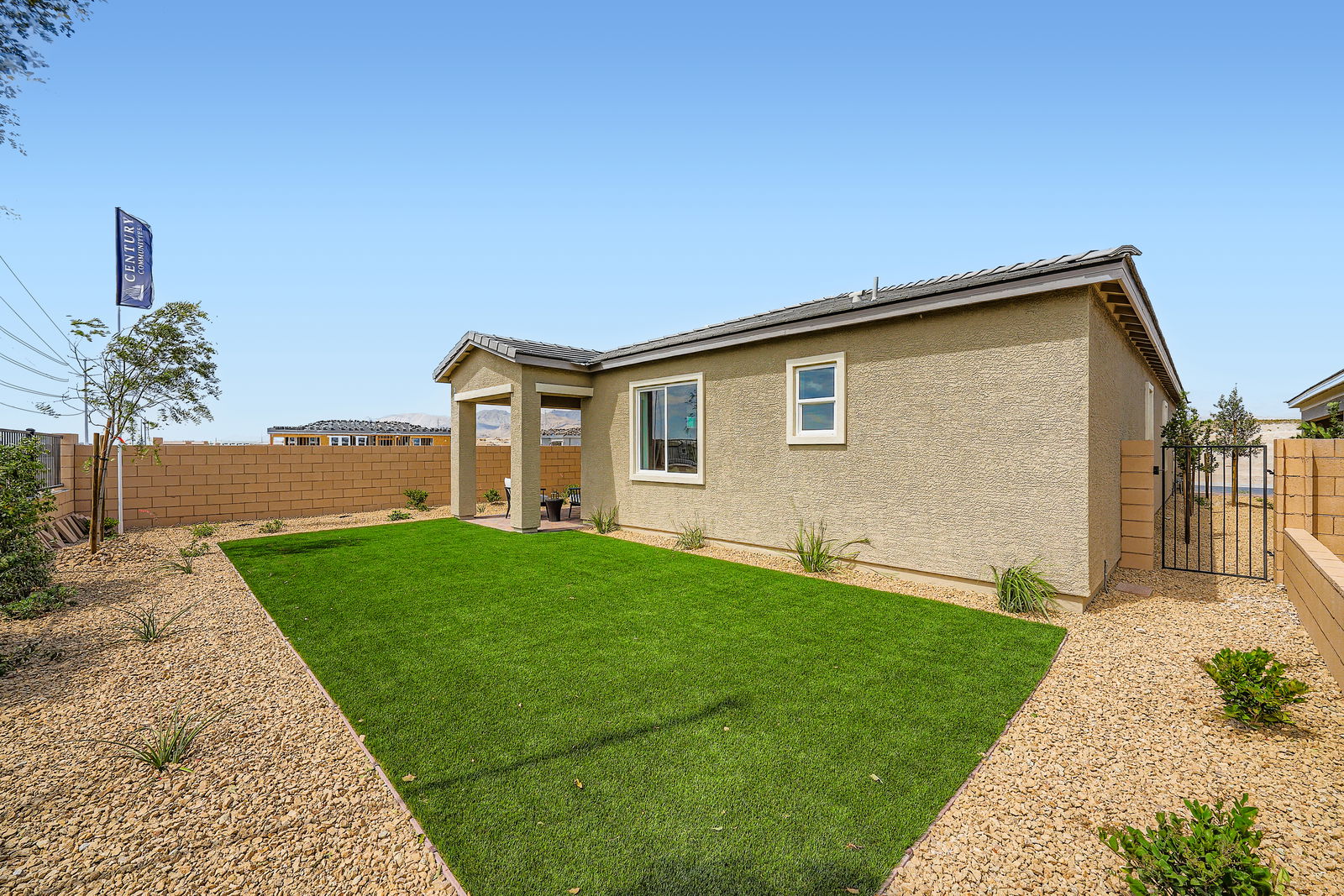 A house with a large front yard.