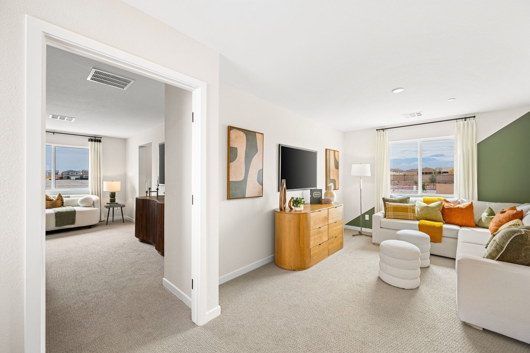 A living room with a tv and couches.