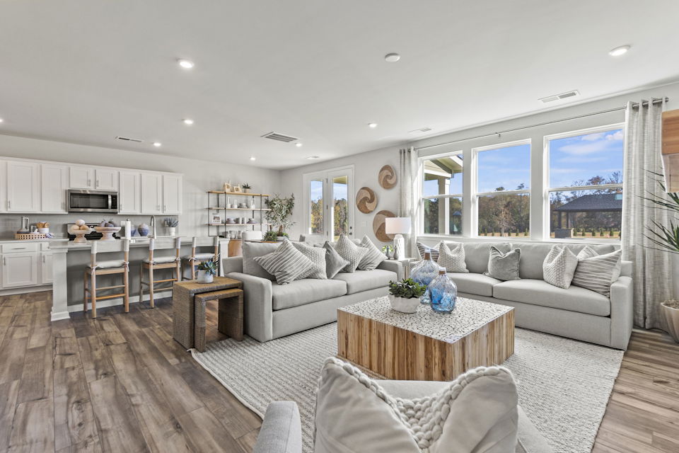 A living room with a large window.