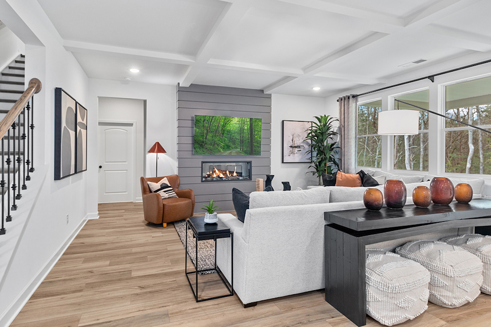 A living room with a white couch.