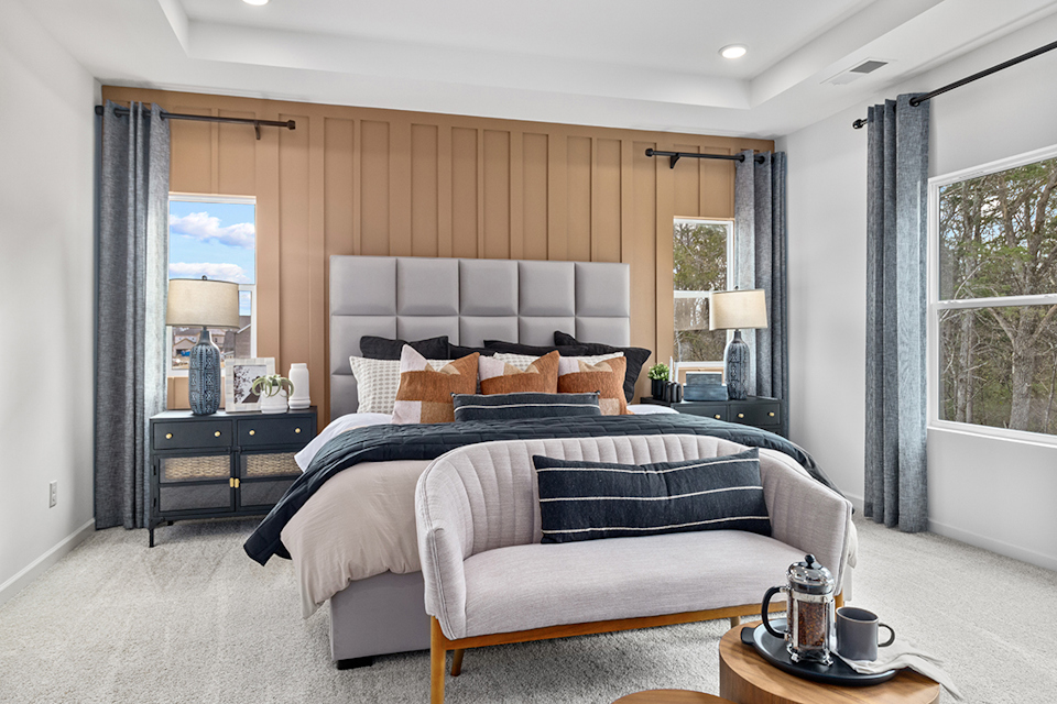 A bedroom with a large bed.