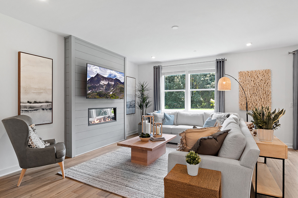 A living room with a couch and a coffee table.