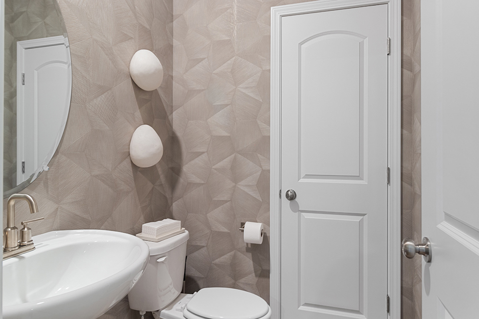 A bathroom with a shower and toilet.