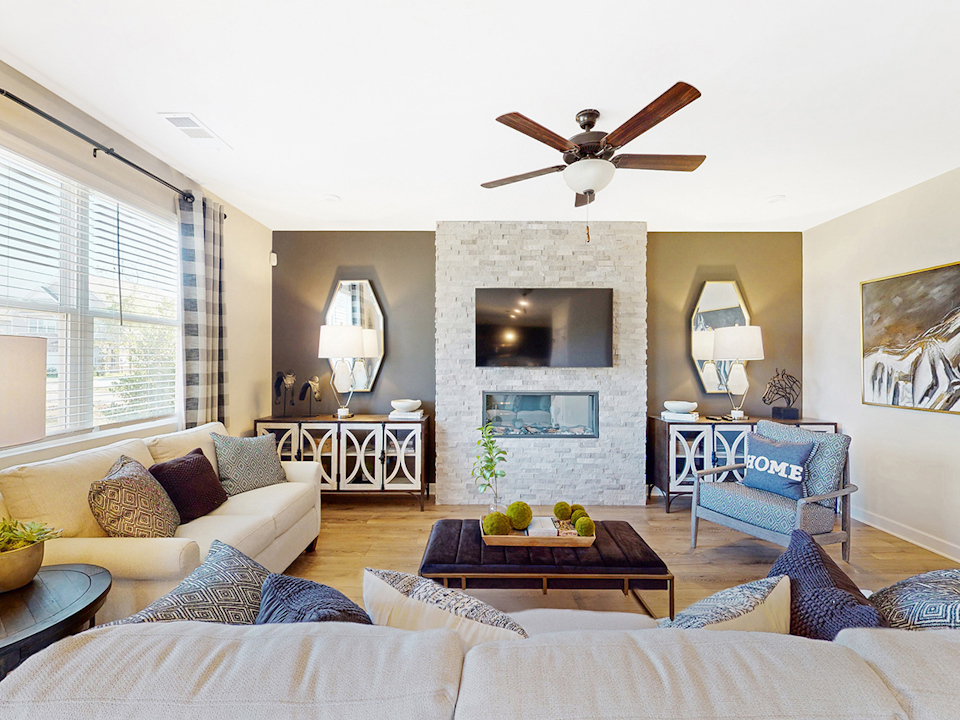 A living room with a fireplace.