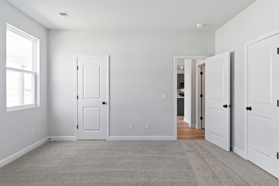 A room with white doors.